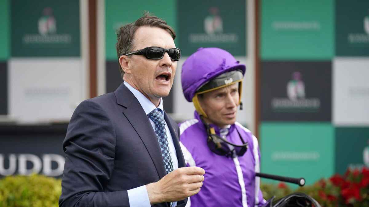 Trainer Aidan O’Brien (left) expects Ryan Moore to be out until next year