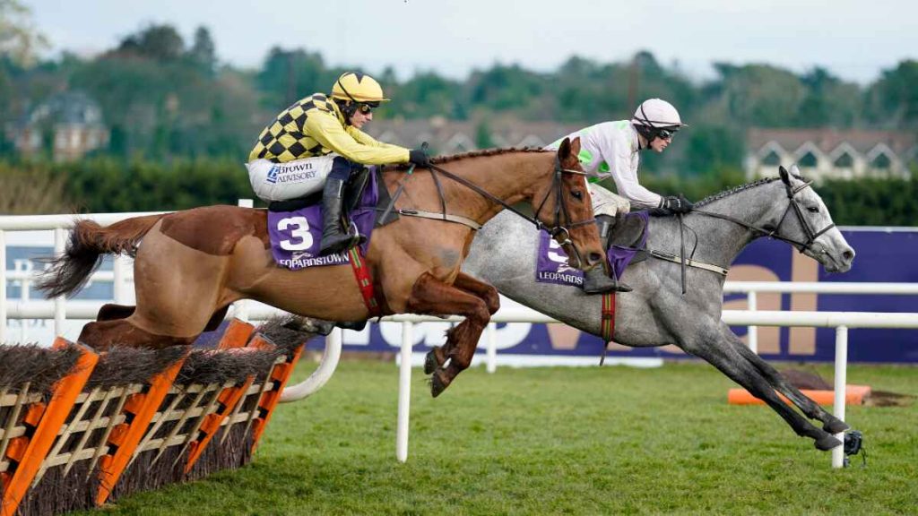 Paul Townend riding State Man (left) and Danny Mullins riding Lossiemouth during The Irish Champion Hurdle at Leopardstown Racecourse