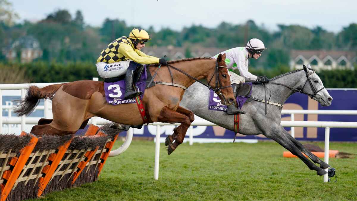 Paul Townend riding State Man (left) and Danny Mullins riding Lossiemouth during The Irish Champion Hurdle at Leopardstown Racecourse