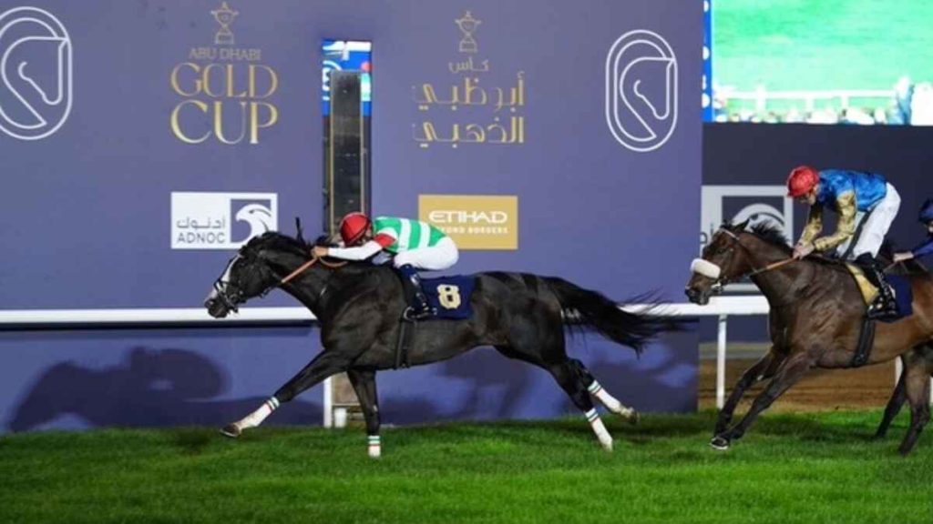 Strauss crosses the finish line for glory