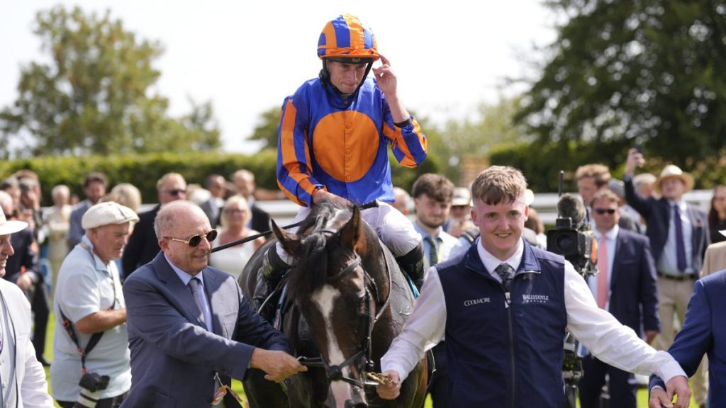 A salute to the crowd from Ryan Moore aboard Scandinavia